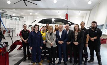 Group of students, Premier and Minister open Electric Automotive Vehicle Training Centre